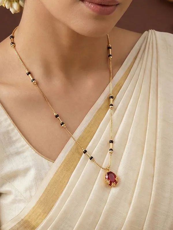 Elegant_Gold-Plated_Mangalsutra_with_Red_Stone_Pendant_for_Women