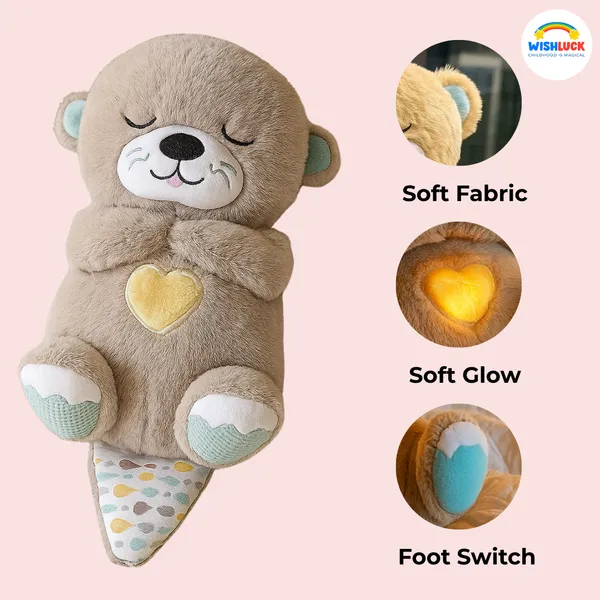 Multicolor_Introducing_The_Soothe_Snuggle_Otter,_The_Perfect_Plush_Companion_Designed_To_Settle_Your_Baby_Into_A_World_Of_Comforting_Cuddles