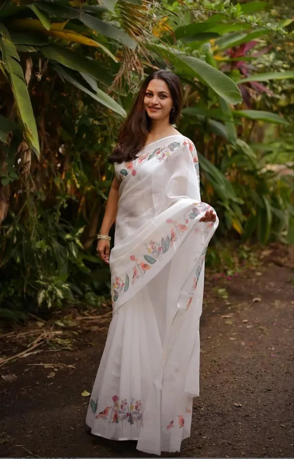 Pure_White_Linen_Saree_with_Bright_Floral_Elegance_For_Women