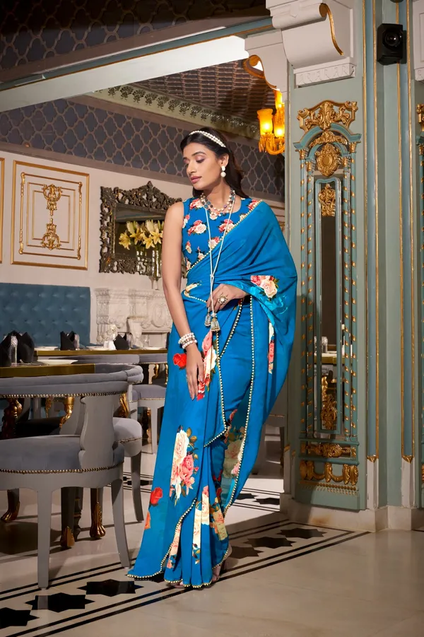 Firozi_georgette_printed_saree_with_Pearl_lace_border_For_Women
