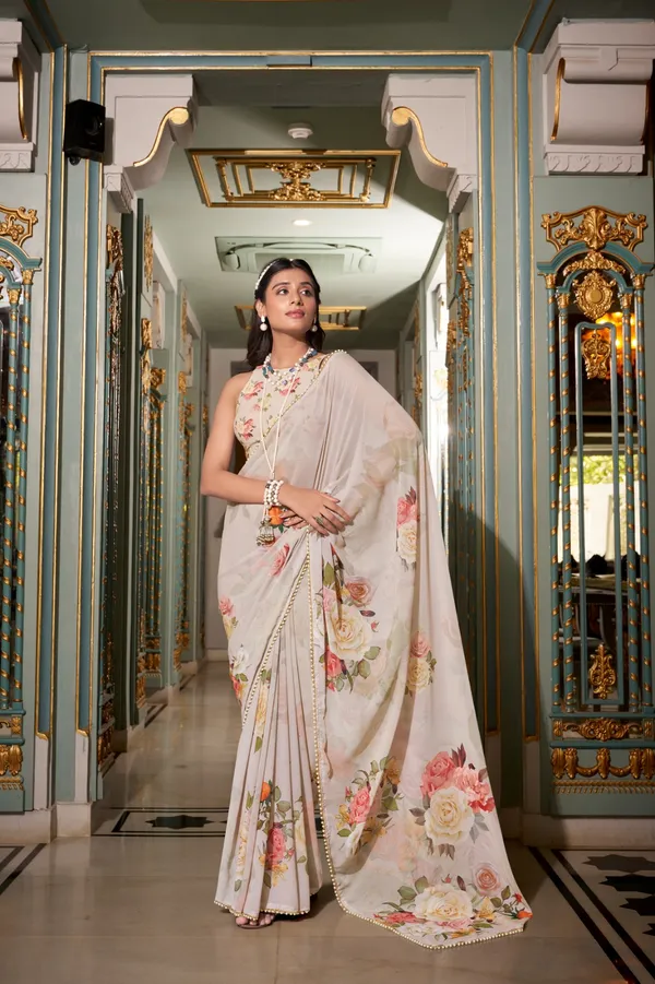 Off_White_georgette_printed_saree_with_Pearl_lace_border_For_Women