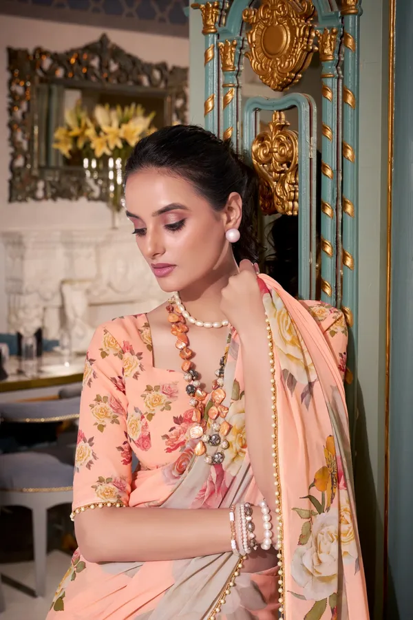 Peach_georgette_printed_saree_with_Pearl_lace_border_For_Women