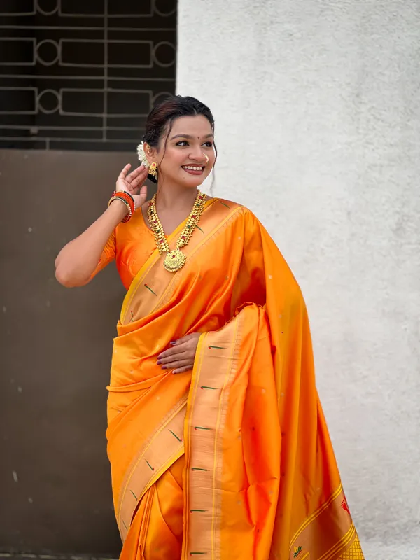 Light_Orange_Soft_Silk_With_Floral_Motifs_Weaved_Saree_With_Blouse_Piece_For_Women_&_Girl