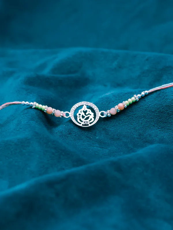 925_Silver_Rakhi_With_Precious_White_Zircon_Stone_For_Women