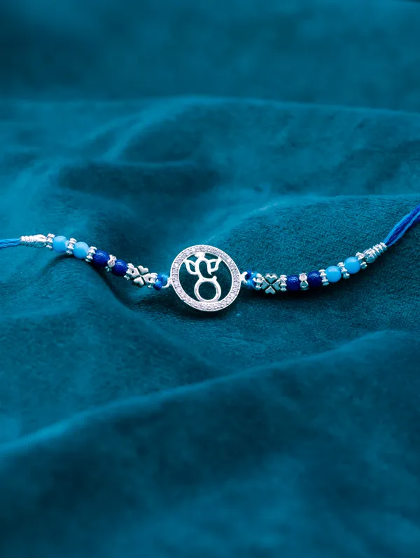 925_Silver_Blue_Rakhi_With_Precious_White_Zircon_Stone_For_Women