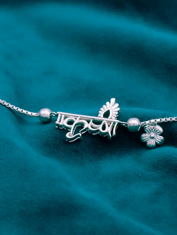 Silver_Rakhi_With_Precious_White_Zircon_Stone_For_Women