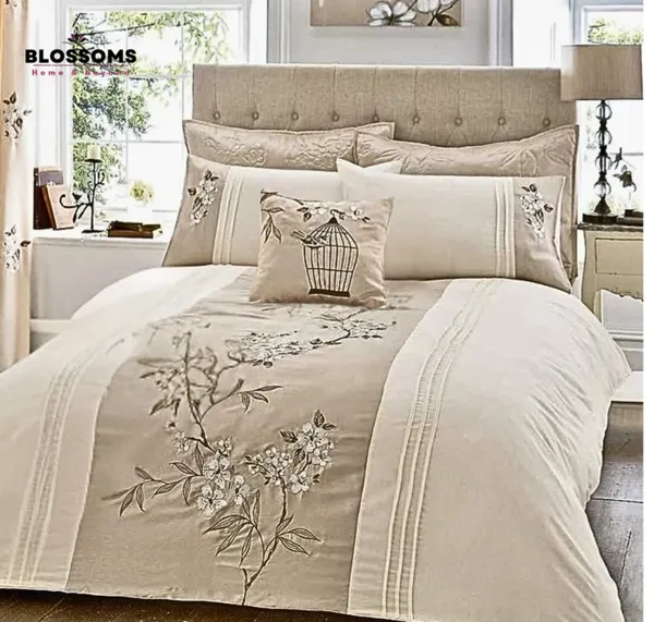 Blossoms_designer_quilted_Bedspread_with_floral_embroidery_,_and_pintex_work_,|_2_designer_pillows_|_|1_cushion_cover_with_filler|_|Set_of_4_pcs_|.