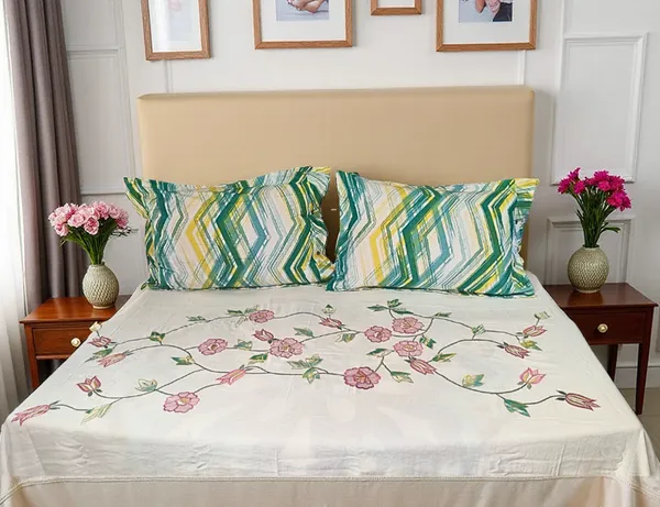 Blossoms_embroidered_bedsheet_with_2_engineered_printed_pillows_._Pure_cotton.Subtle_off-white_color.