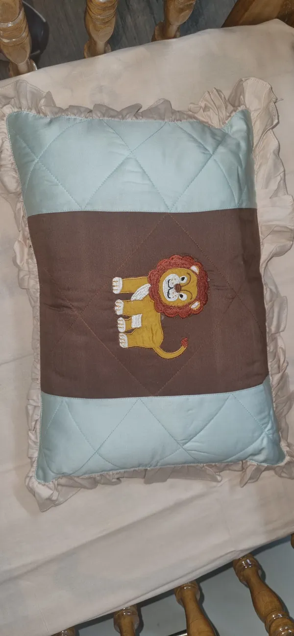 Blossoms_kids_bedding_set_with_1_bedsheet_(35"x50"),1_pillow_with_filler(12"x15")_,_2_bolsters_with_filler_(15"x15")_1_quilt_brown_colour(_35"x40")Ideal_for_upto_3_years)