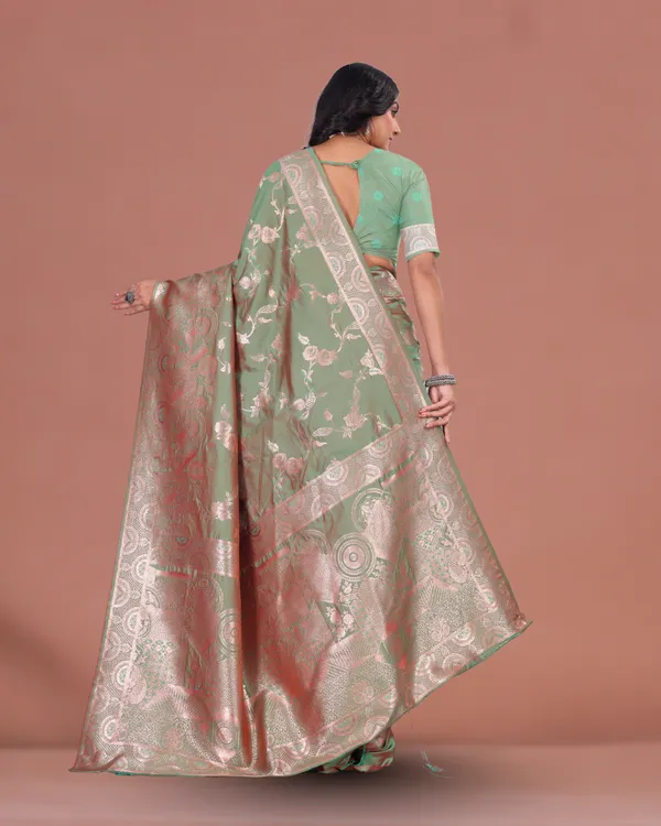 Mint_Green_Banarasi_Silk_Saree_with_Intricate_Silver_Zari_and_Rich_Traditional_Pallu