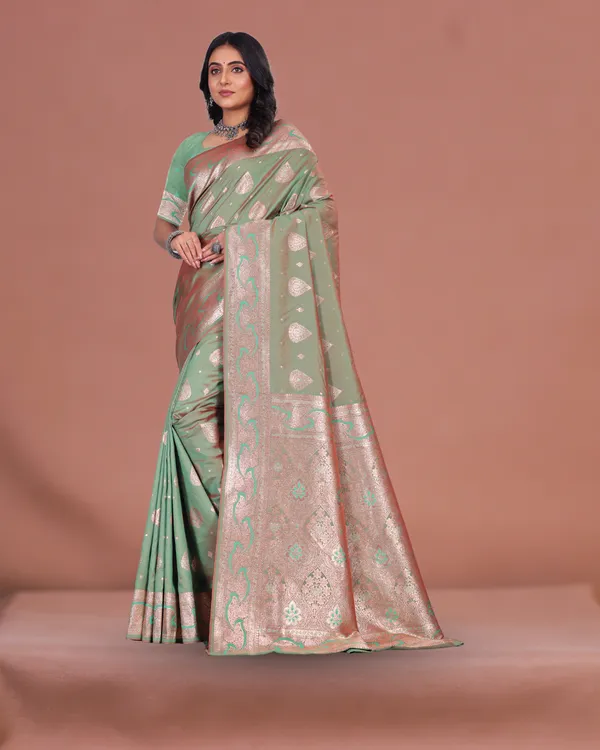 Mint_Green_Banarasi_Silk_Saree_with_Silver_Zari_Weaving_and_Traditional_Motifs