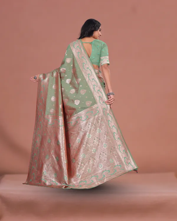 Mint_Green_Banarasi_Silk_Saree_with_Silver_Zari_Weaving_and_Traditional_Motifs