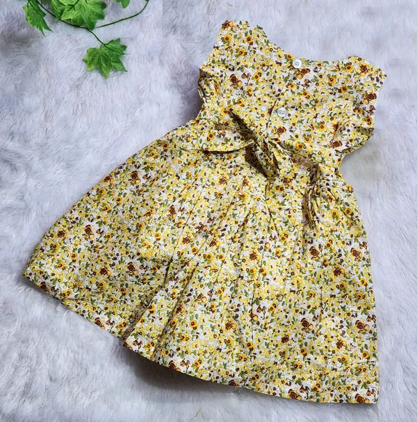 Yellow_Pure_Cotton_Sleeveless_Round_Neck_Fit_And_Flare_Dress_For_Girls
