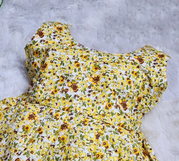 Yellow_Pure_Cotton_Sleeveless_Round_Neck_Fit_And_Flare_Dress_For_Girls