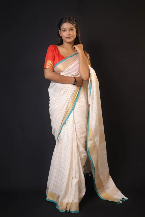 Off-White_Linen_Blend_Saree_with_Copper-Turquoise_Blue_Border_|_Handwoven_Bhagalpuri_Festive_Saree_–_Hatha_Karagha