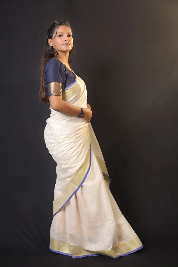 Off-White_Linen_Blend_Saree_with_Golden-Blue_Border_|_Handwoven_Bhagalpuri_Festive_Saree_–_Hatha_Karagha