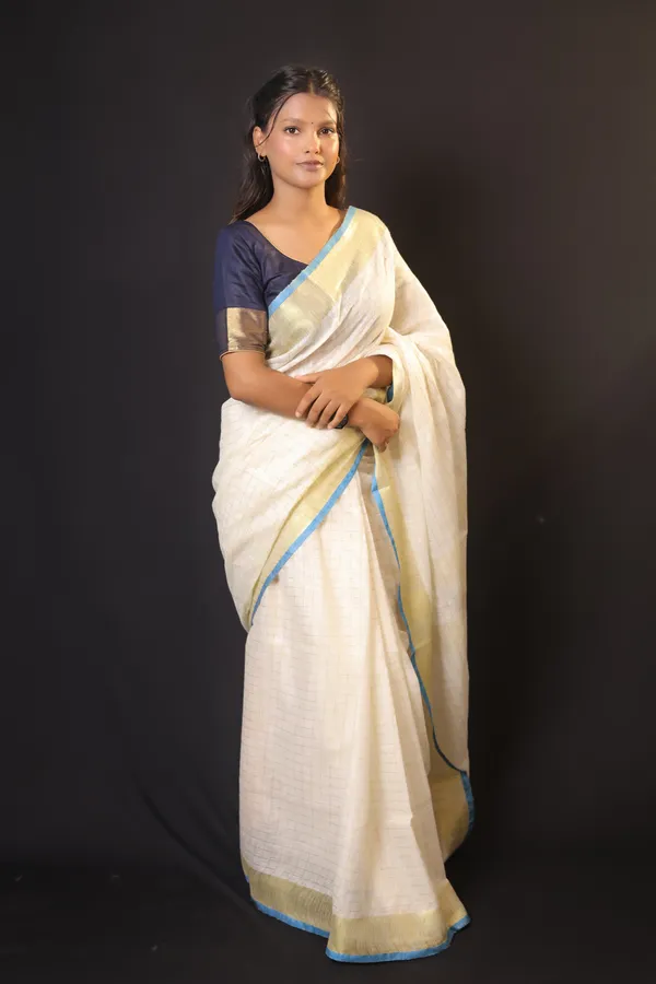 Off-White_Linen_Blend_Saree_with_Golden-Light_Blue_Border_|_Handwoven_Bhagalpuri_Festive_Saree_–_Hatha_Karagha