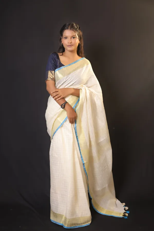 Off-White_Linen_Blend_Saree_with_Golden-Light_Blue_Border_|_Handwoven_Bhagalpuri_Festive_Saree_–_Hatha_Karagha