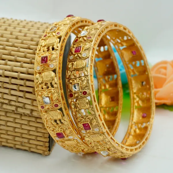 Golden_Alloy_Premium_And_Elegant_Elephant_Carvings_Design_Bangle_For_Women