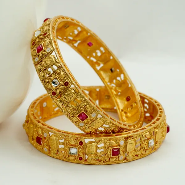 Golden_Alloy_Premium_And_Elegant_Elephant_Carvings_Design_Bangle_For_Women
