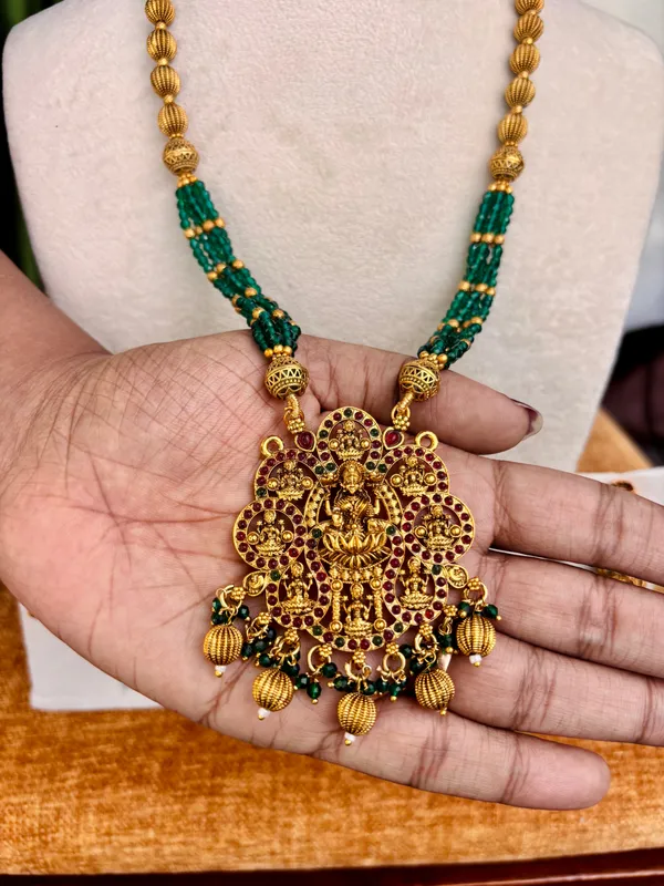 Lakshmi_pendant_with_green_beads_Haram