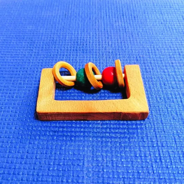 Natural_Teether_for_Kids,_Beech_Wood_Rectangle_Rattle_with_Colourful_Rings,_Baby_Rattle_Made_of_Alternative_Plastic,_Gifts_for_New_Born_Babies,_Antibacterial_and_Anti-fungal,_BPA_Free,_Non-Toxic