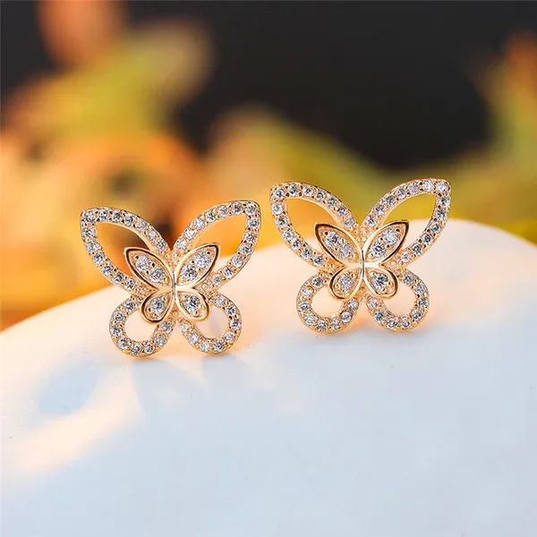 Gold_Plated_American_Diamond_Studded_Dual_Butterfly_Shaped_Korean_Stud_Earrings