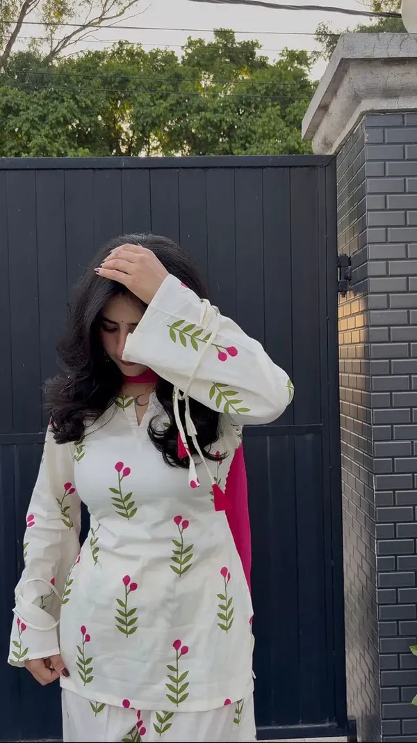 Off-White_Floral_Printed_Cotton_Kurta_with_Farshi_Palazzos/Salwar_and_a_Pink_Dupatta_Set.