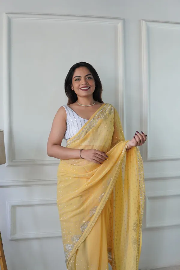 Yellow_Georgette_Premium_&_Elegant_Saree_With_Unstiched_Blouse_For_Women