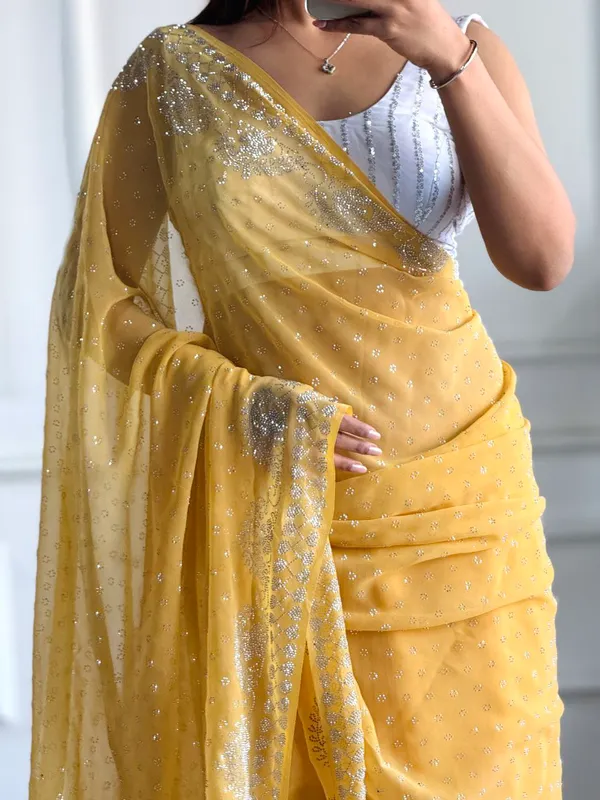 Yellow_Georgette_Premium_&_Elegant_Saree_With_Unstiched_Blouse_For_Women