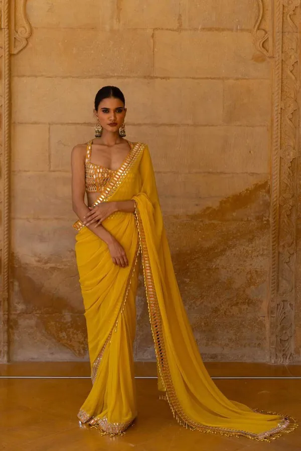Yellow_Georgette_Premium_&_Elegant_Saree_With_Unstiched_Blouse_For_Women