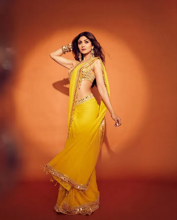Yellow_Georgette_Premium_&_Elegant_Saree_With_Unstiched_Blouse_For_Women