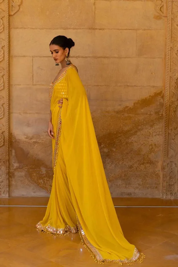 Yellow_Georgette_Premium_&_Elegant_Saree_With_Unstiched_Blouse_For_Women