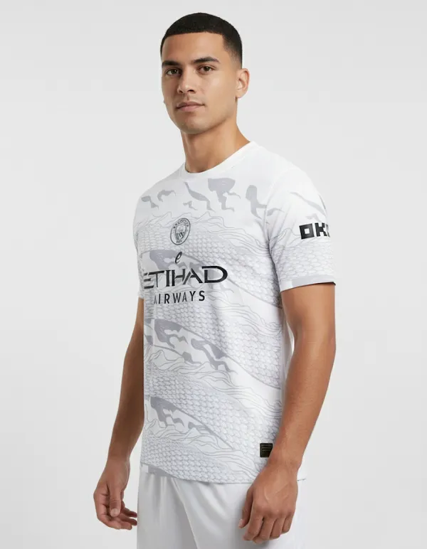 Manchester_City_Fc_23/24_Printed_Round_Neck_White_Year_Of_The_Dragon_Jersey