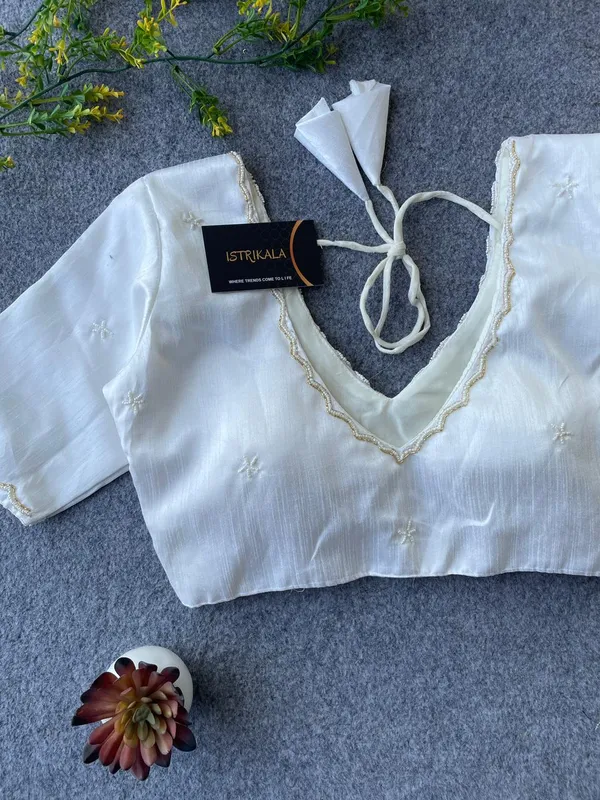 Elegant_White_Hand-Embroidered_Blouse_with_Mirror_Bead_Detailing