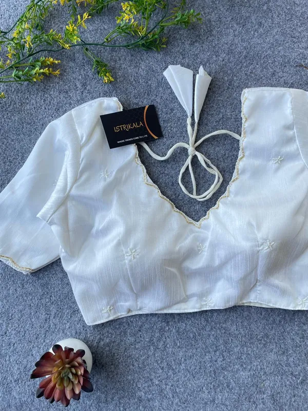 Elegant_White_Hand-Embroidered_Blouse_with_Mirror_Bead_Detailing