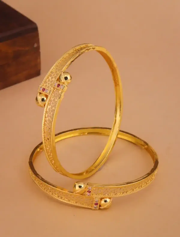 Golden_Aura_Cutwork_Bangles_??Elegant_Texture_With_Stone_Highlights