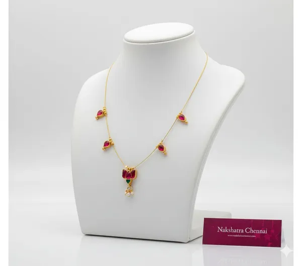 Elegant_Gold-Plated_Ruby_Pink_Stone_Necklace_With_Pearl_Drop_Pendant