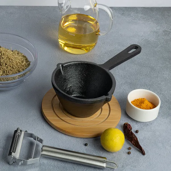 Black_Cast_Iron_Tadka_Pan_For_Kitchen_Use