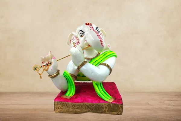 Cultured_Marble_Hand_Crafted_Statue_Of_Lord_Ganesh_Playing_Flute_I_Ganesh_Idol_I_Lord_Ganapathi_For_Pooja,_Gift_&_Home/Office_Decoration_(11X9_Inch)