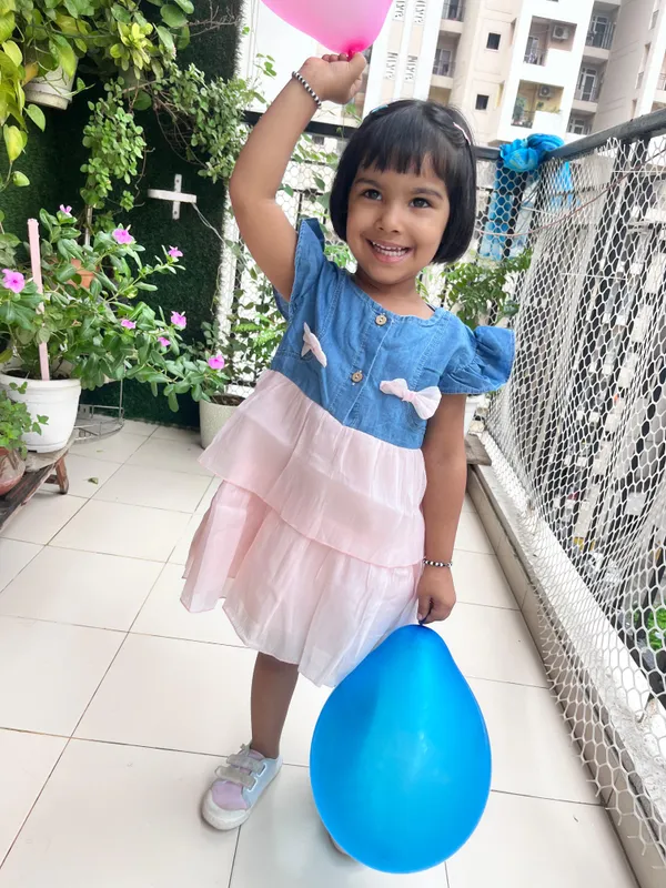 Pink_Trendy_&_Comfortable_Adorable_Tiered_Dress_Features_A_Denim-Style_Bodice_Adorned_With_Delicate_Bows_For_Girls