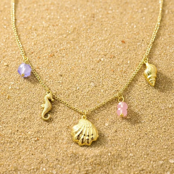 Sirena_Shell_Necklace_with_Charms_-_seahorse,_beads,_charms