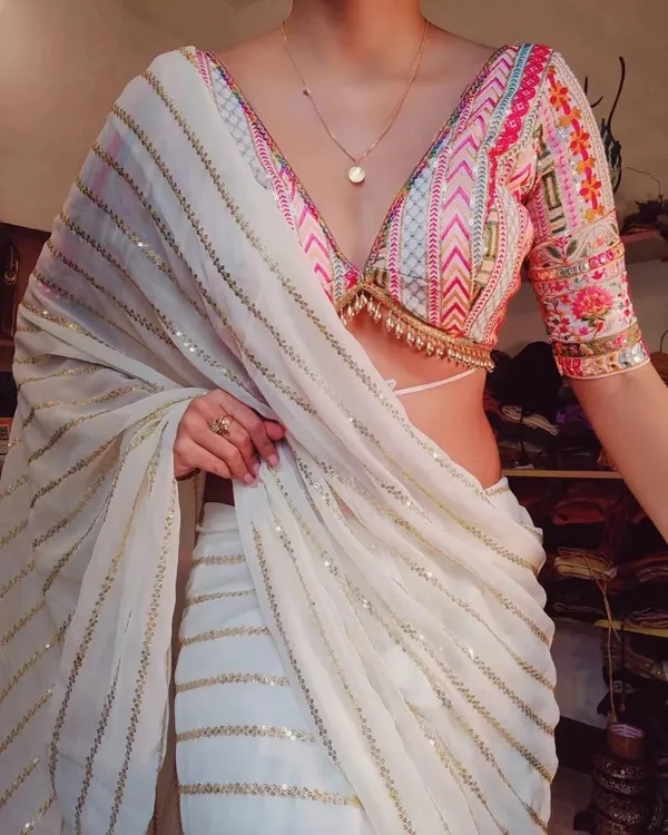White_Georgette_Premium_&_Elegant_Saree_With_Unstiched_Blouse