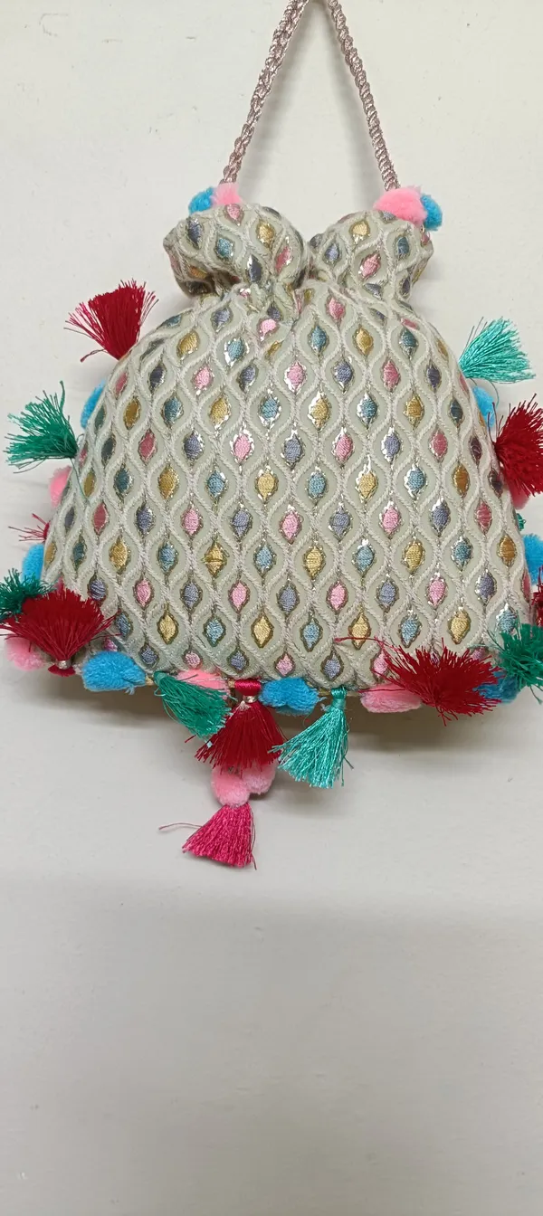 Grey_Cotton_Embroidered_Potli_Bag_With_Pom_Pom_Tassels_For_Women