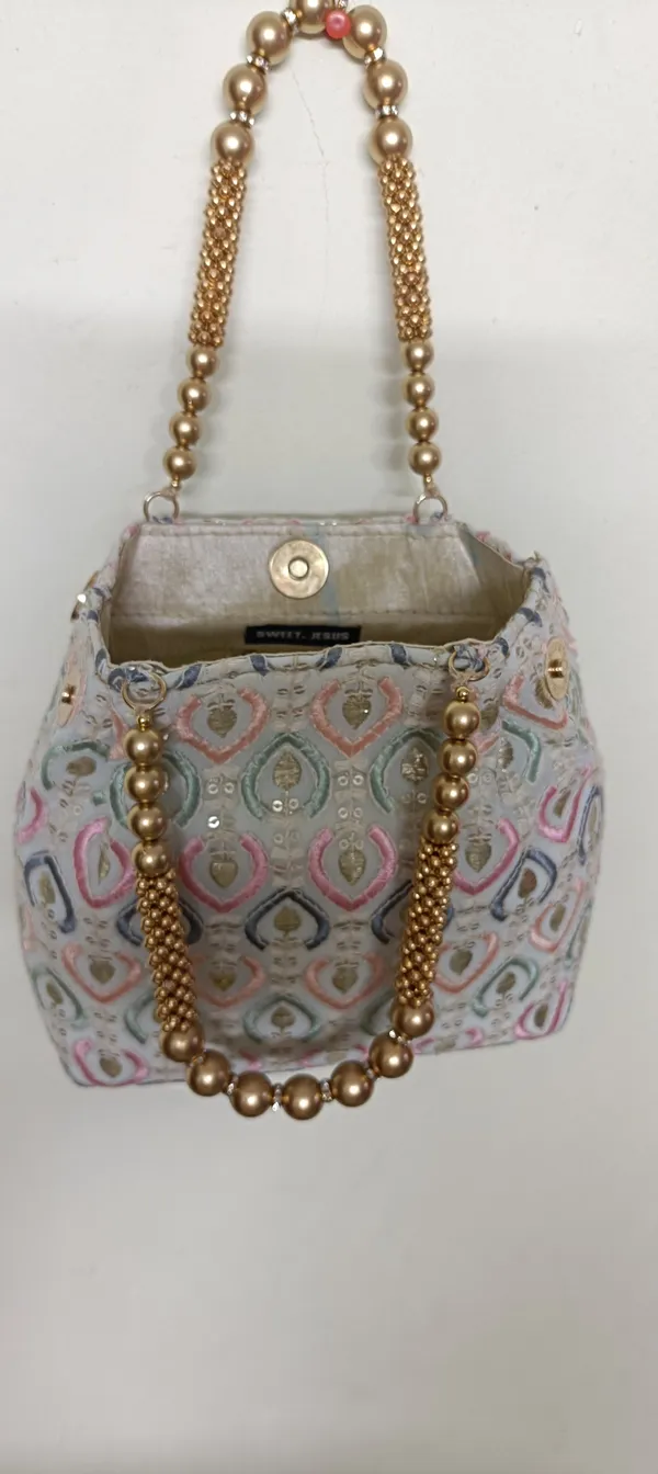 Cotton_Embroidered_Beaded_Handle_Potli_Handbag_For_Women