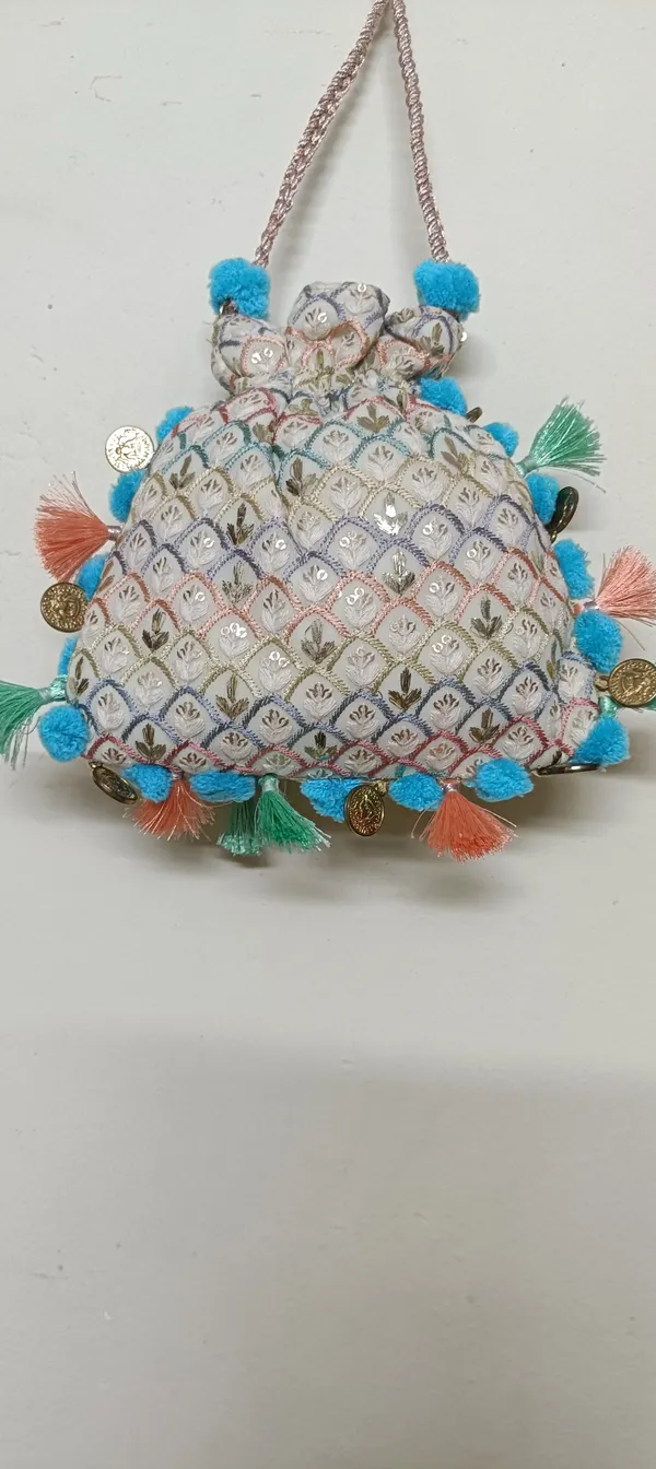 Cotton_Sequin_Embroidered_Potli_Bag_With_Pom_Pom_Tassels_For_Women