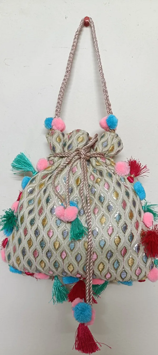 Grey_Cotton_Embroidered_Potli_Bag_With_Pom_Pom_Tassels_For_Women