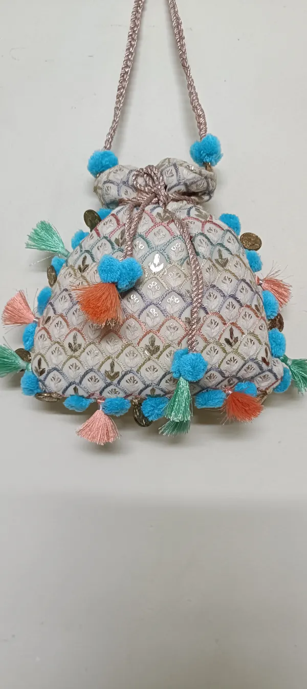 Cotton_Sequin_Embroidered_Potli_Bag_With_Pom_Pom_Tassels_For_Women