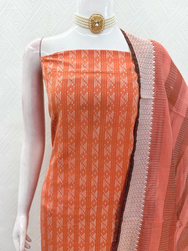Leeza_Store_Women’s_Orange_Cotton_Jacquard_Unstitched_Dress_Material_With_Minimal_Ethnic_Motifs,_Solid_Cotton_Bottom_&_Cut_Work_Dupat