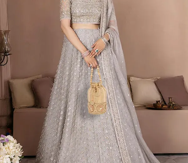 Gold_Drawstring_Closure_With_Crystal_Embellishments_Elegant_Pearl_Beaded_Potli_Bag_